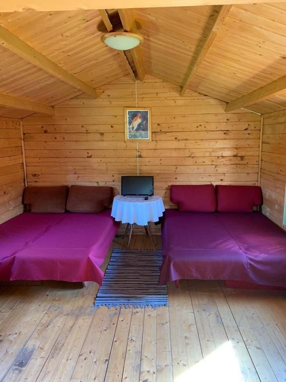 Лоджи Tranquil Log Cabin Retreat in Šventoji Швянтойи-20