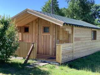 Лоджи Tranquil Log Cabin Retreat in Šventoji Швянтойи-0