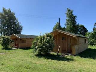 Лоджи Tranquil Log Cabin Retreat in Šventoji Швянтойи-1