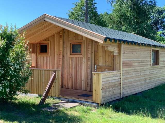 Лоджи Tranquil Log Cabin Retreat in Šventoji Швянтойи-16